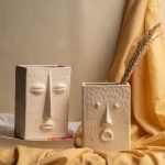 ceramic face vases in rectangular shape
